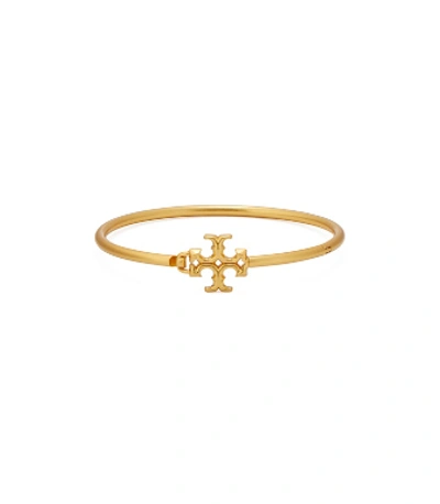 Shop Tory Burch Eleanor Hinged Cuff In Rolled Brass