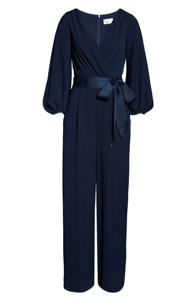 Shop Eliza J Faux Wrap Long Sleeve Jumpsuit In Navy