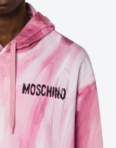 Shop Moschino Painting Hoodie In Pink