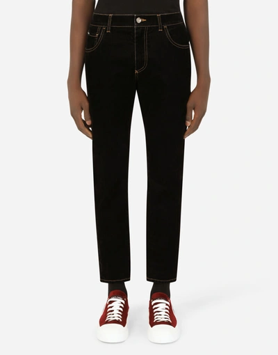 Shop Dolce & Gabbana Flocked Slim-fit Stretch Jeans In Black