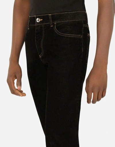 Shop Dolce & Gabbana Flocked Slim-fit Stretch Jeans In Black