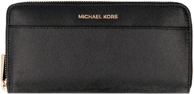 Shop Michael Michael Kors Zipped Logo Continental Wallet In Black