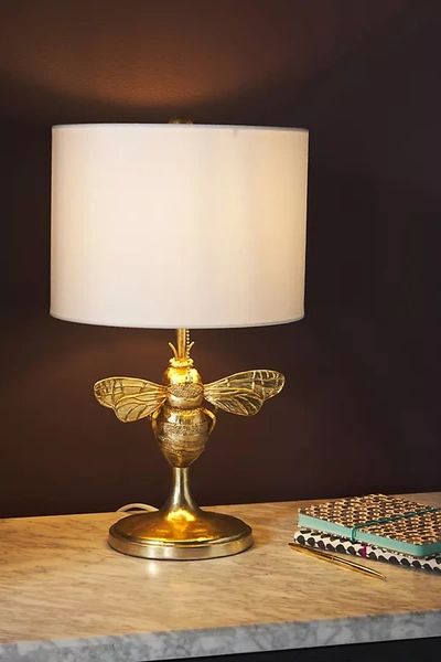 Shop Anthropologie Bumblebee Table Lamp In Gold
