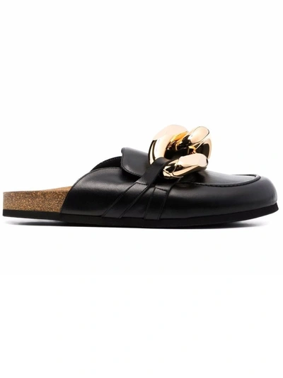 Shop Jw Anderson Black Leather Mules In Nero