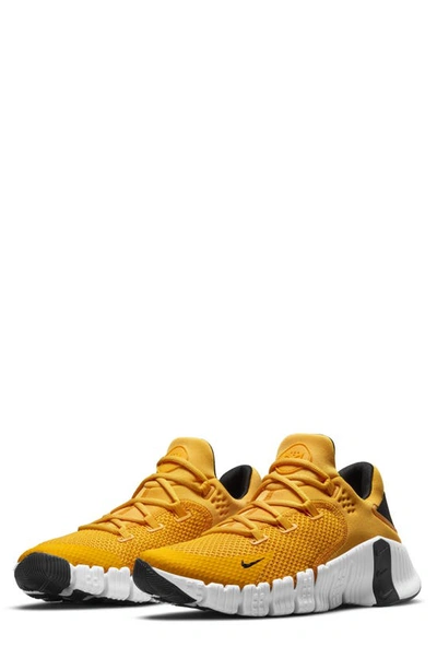 Shop Nike Free Metcon 4 Training Shoe In Gold/ Gold/ Black