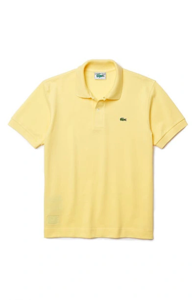 Shop Lacoste Pique Cotton Polo In 107 Yellow