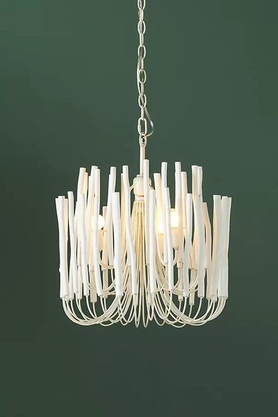 Shop Anthropologie Tiered Tapers Chandelier By  In White Size S