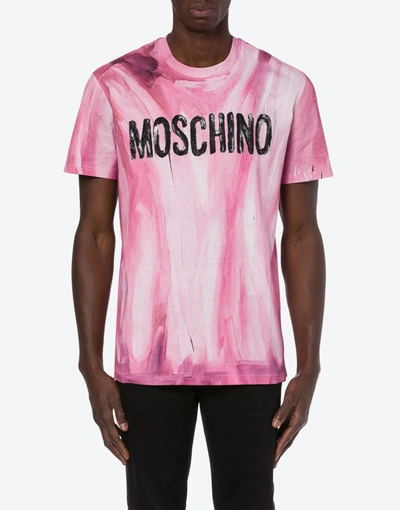 Shop Moschino Painted Logo Jersey T-shirt In Orange