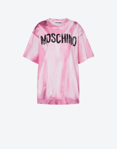 Shop Moschino Painted Logo Jersey T-shirt In Pink
