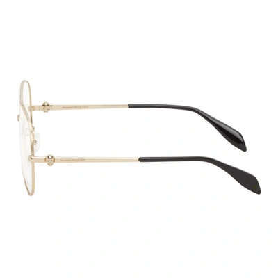Shop Alexander Mcqueen Gold Aviator Glasses In 001 Gold