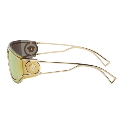 Shop Versace Gold Shield Medusa Sunglasses In Gold/gold