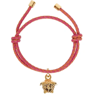 Shop Versace Pink & Orange Braided Leather Medusa Bracelet In 2o15v Red