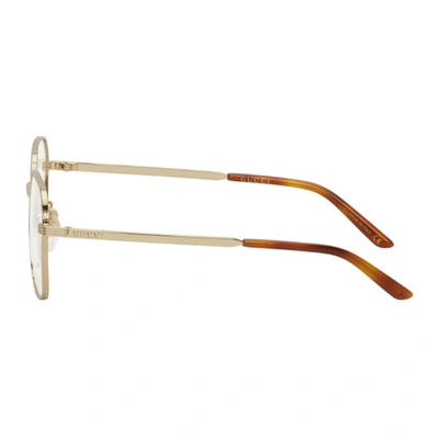 Shop Gucci Gold Rounded Square Glasses In 002 Gold