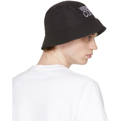 Shop Versace Jeans Couture Black & White Logo Bucket Hat In Emi9 Blkwht