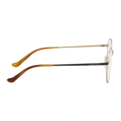 Shop Gucci Gold Round Glasses In 005 Gold