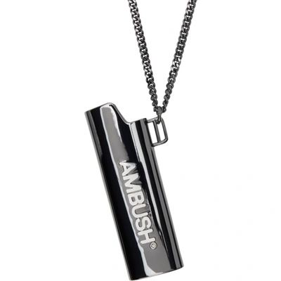 Shop Ambush Gunmetal Logo Lighter Case Necklace In Black