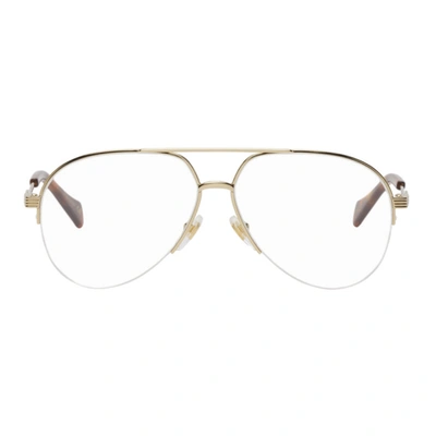 Shop Gucci Gold Shiny Endura Aviator Glasses In 001 Gold