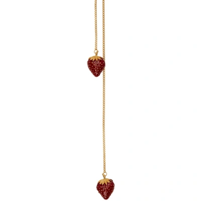 Shop Saint Laurent Gold Strawberry Bolo Necklace In 9178 Aged Gold/red