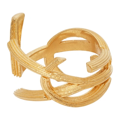 Shop Saint Laurent Gold Striated Monogram Ring In 8060 Laiton Gold