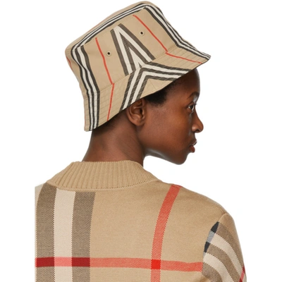Shop Burberry Reversible Beige Icon Stripe Bucket Hat In Archive Beige