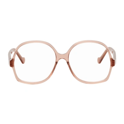 Shop Loewe Pink Thin Oval Glasses In 072 Shiny Transparen