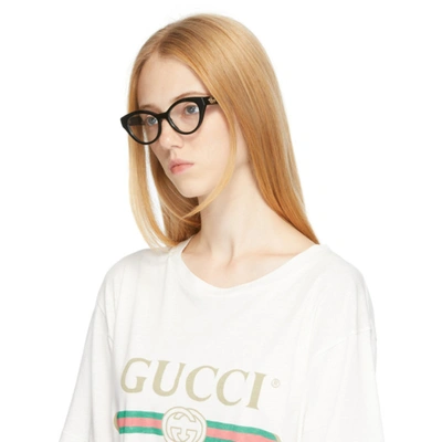 Shop Gucci Black Oval Gg Glasses In 001 Black