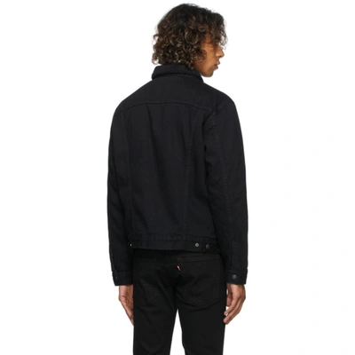 Shop Levi's Black Denim Sherpa Trucker Jacket In T5000 Berk Sherpa Tr