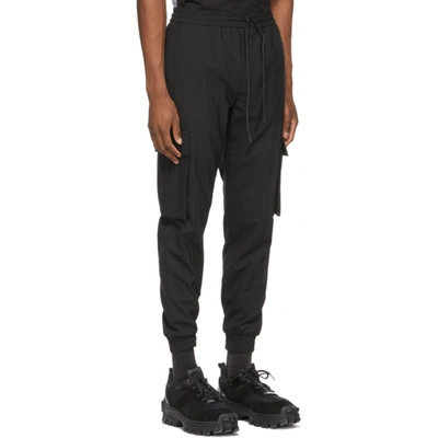 Shop Juunj Black Stretch Jogger Cargo Pants In 5 Black