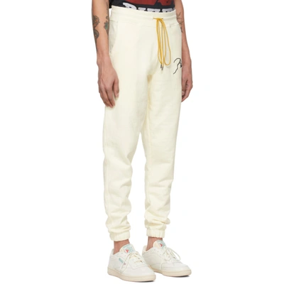 Shop Rhude Off-white Logo Lounge Pants In Créme