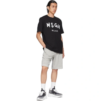 Shop Msgm Black Paint Brushed Logo T-shirt In 99 Black
