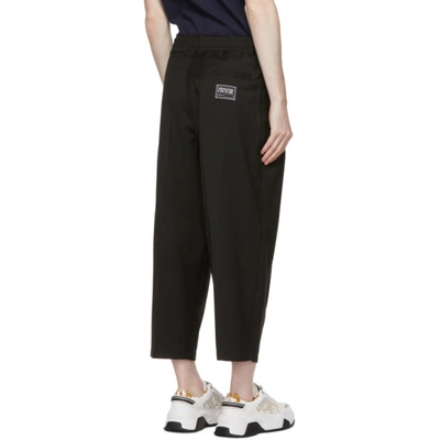 Shop Versace Jeans Couture Black Wool Logo Ribbon Wide Trousers In E899 Black