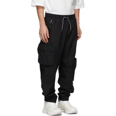 A. A. SPECTRUM BLACK JERSEY CARGO PANTS