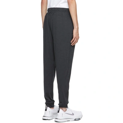Shop Nike Grey Yoga Dri-fit Lounge Pants In Off Noir/black/gray