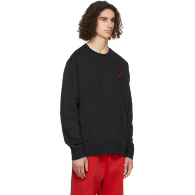 Shop Nike Black & Red Sportswear Club Sweatshirt In Blk/uni Red