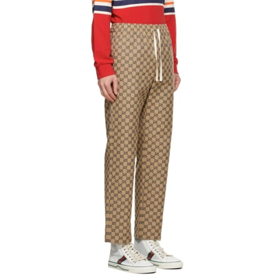 Shop Gucci Beige & Navy Canvas Gg Trousers In 9078 Paste/blue