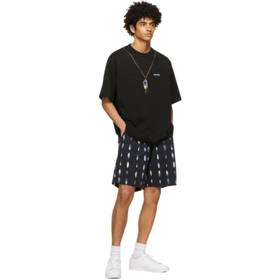 Shop Marcelo Burlon County Of Milan Navy Allover Feathers Shorts In Black Blue