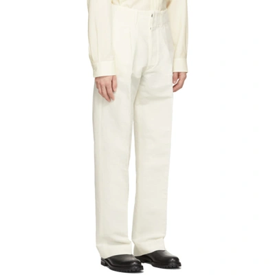 Shop Uniforme Off-white Wide Leg Pleated Trousers In Offwhite