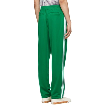 Shop Adidas X Human Made Green Firebird Track Pants