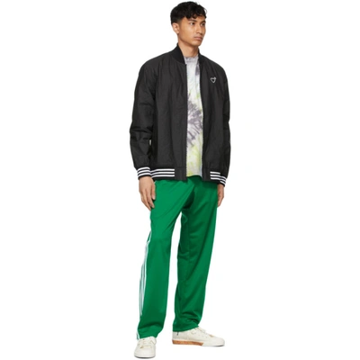 Shop Adidas X Human Made Green Firebird Track Pants