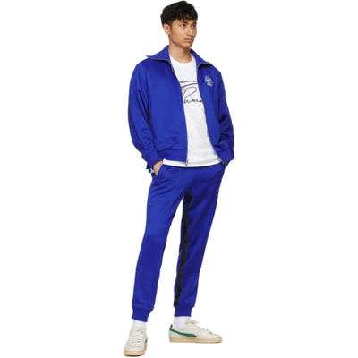 Shop Rhude Blue Puma X Rhuigi Edition Logo Track Pants