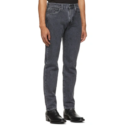 Shop Levi's Black 502 Taper Jeans In Black Wate