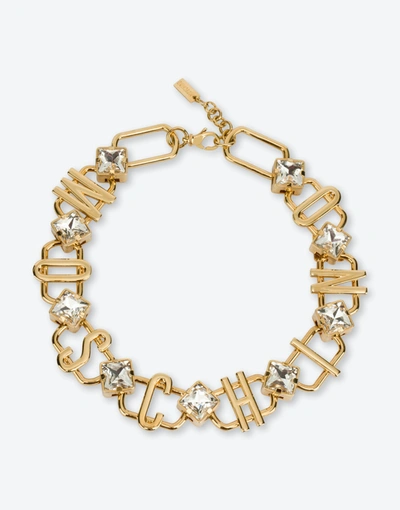 Shop Moschino Choker Necklace With Logo And Crystals In Gold