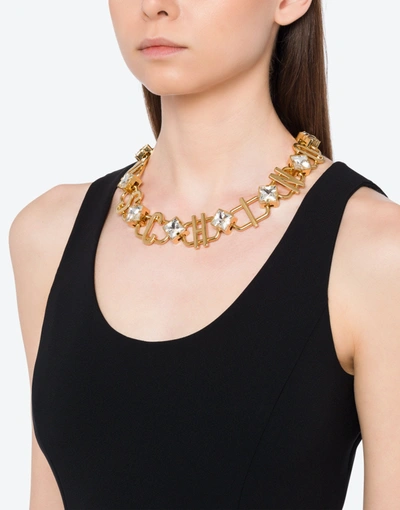 Shop Moschino Choker Necklace With Logo And Crystals In Gold