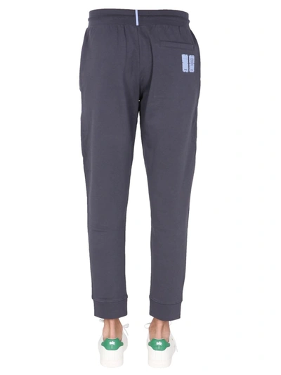 Shop Mcq By Alexander Mcqueen Jogging Pants With Logo Patch In Grey