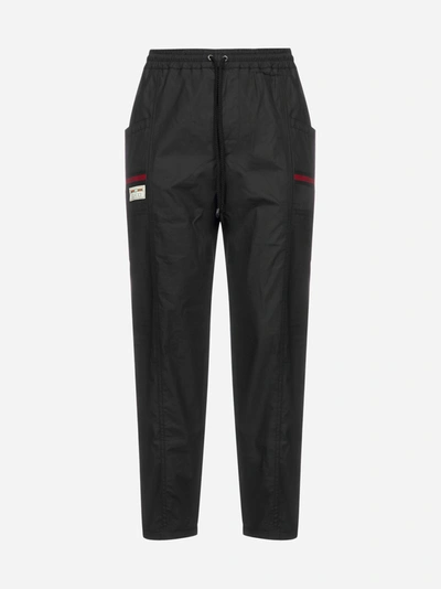 Shop Gucci Web And Logo Cotton Trousers