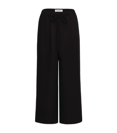 Shop Valentino Silk Wide-leg Cropped Trousers In Black