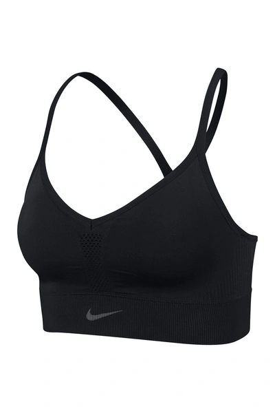 Shop Nike Indy Seamless Bra In Black/dk Smoke Grey