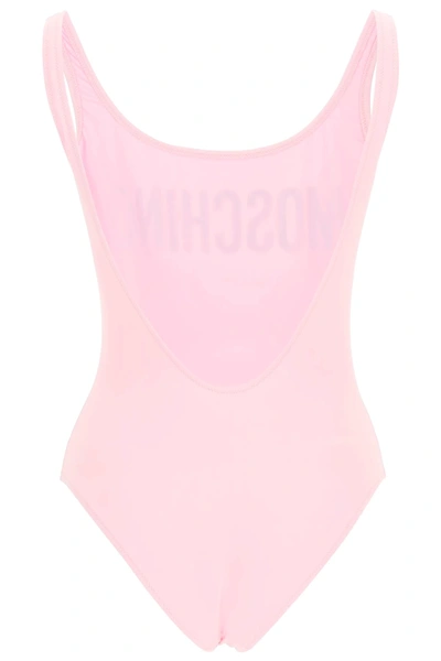 Shop Moschino Grafic Logo Swimsuit In Pink