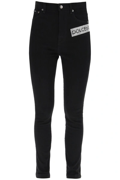 Shop Dolce & Gabbana Crystal Logo Jeans In Black