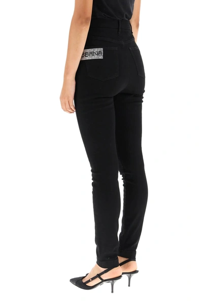 Shop Dolce & Gabbana Crystal Logo Jeans In Black